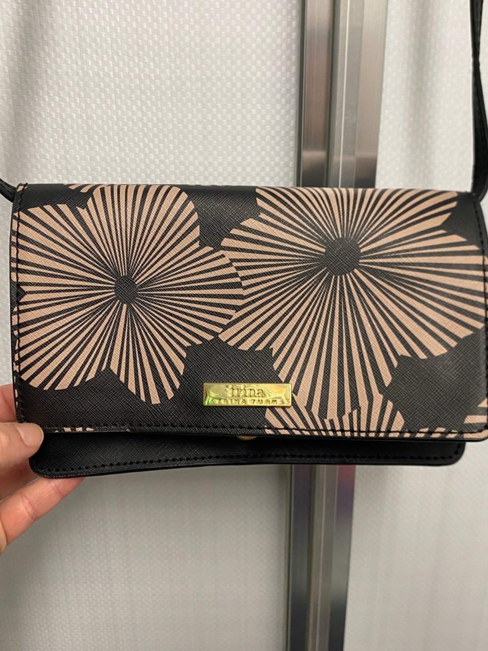 Floral pattern clutch with shoulder strap